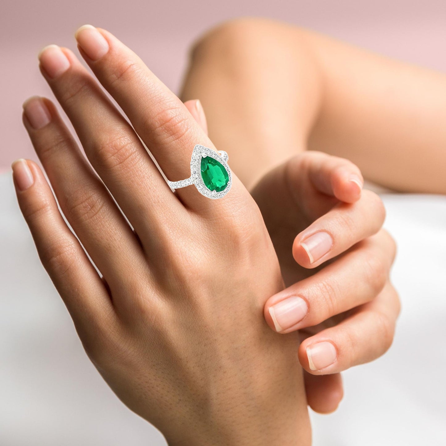 PEAR EMERALD HALO RING IN SILVER