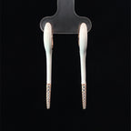 WHITE ROSE GOLD GLIDE EARRINGS