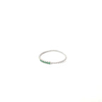 TWISTED SILVER BAND WITH EMERALD STONES