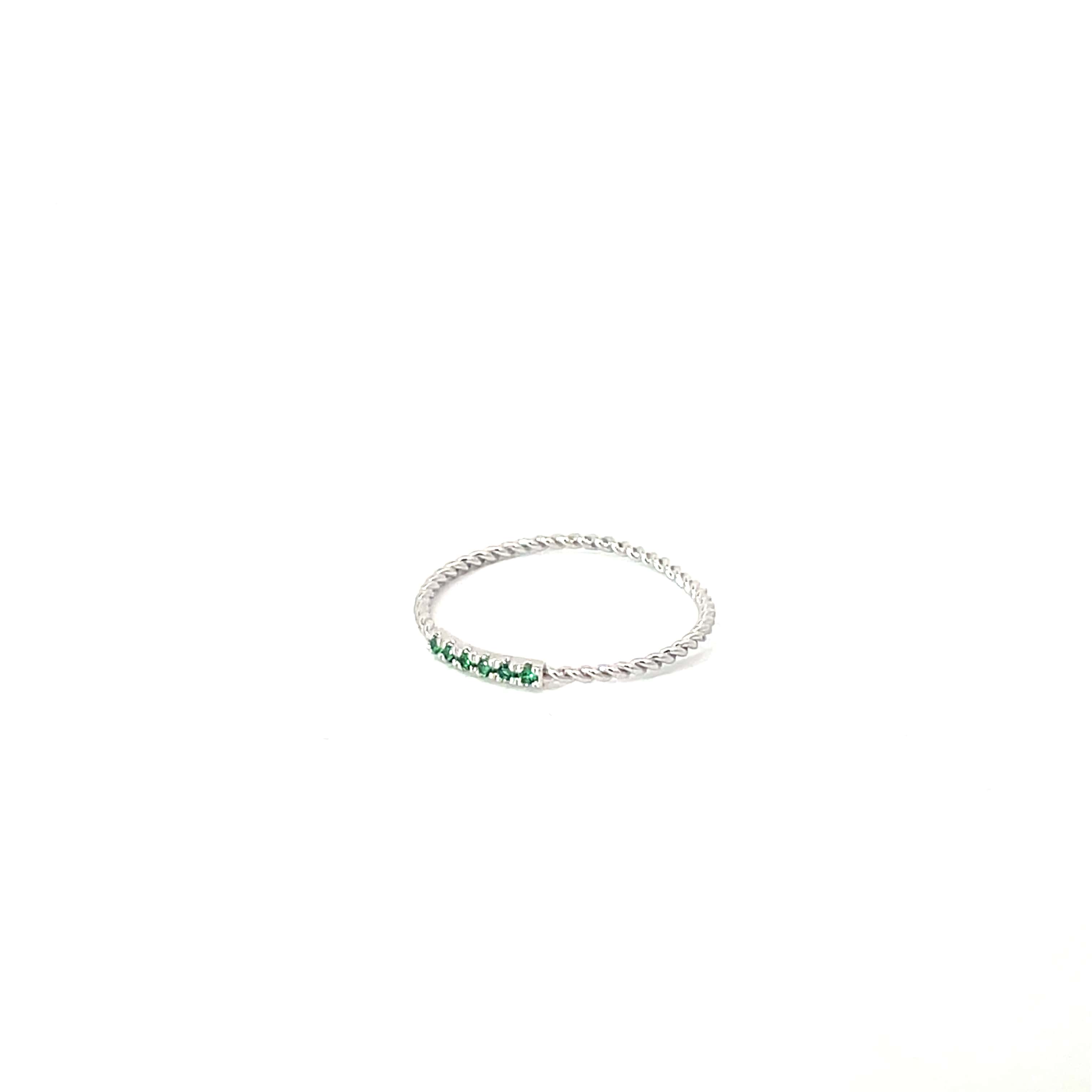 TWISTED SILVER BAND WITH EMERALD STONES