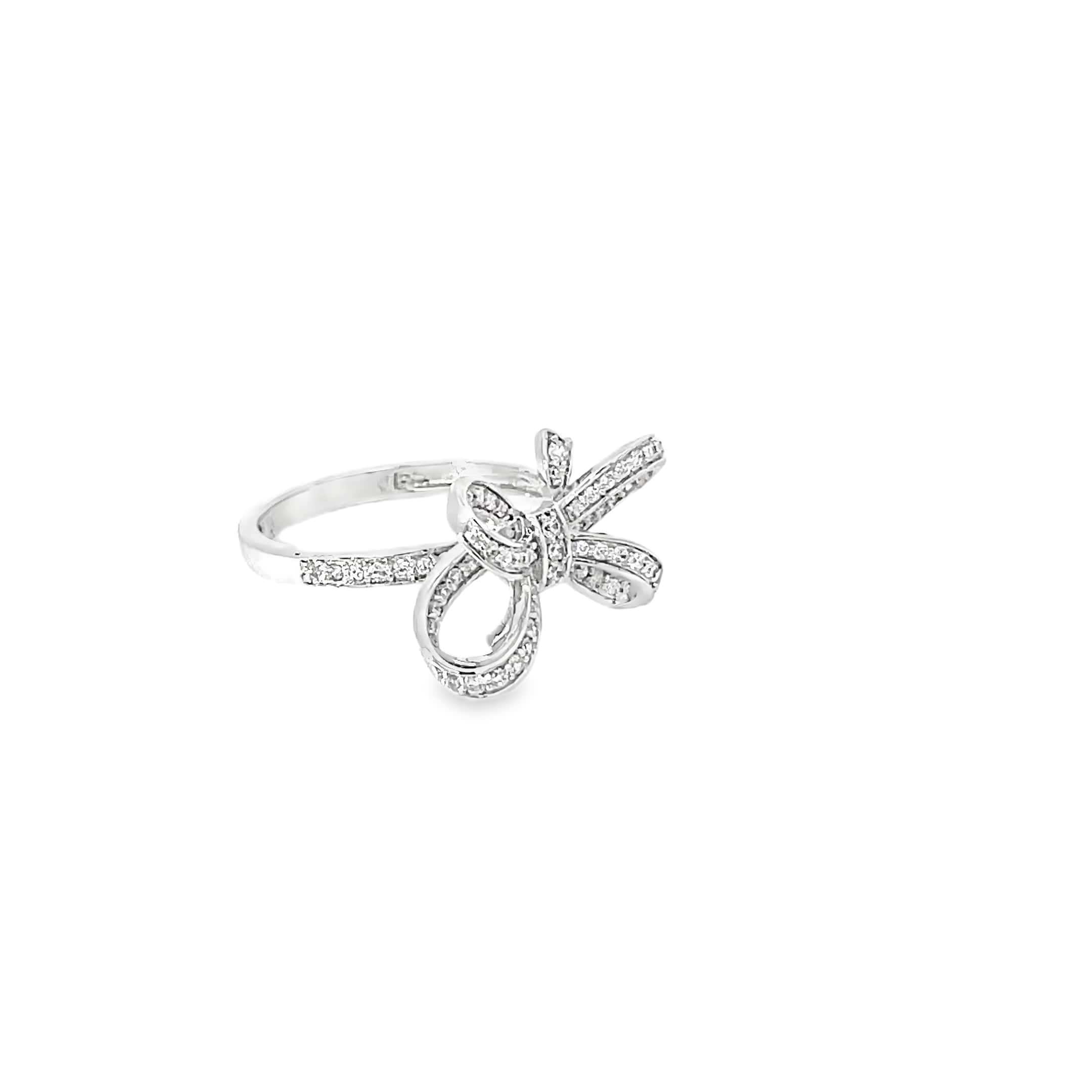 SPARKLING BOW TIE RING IN SILVER