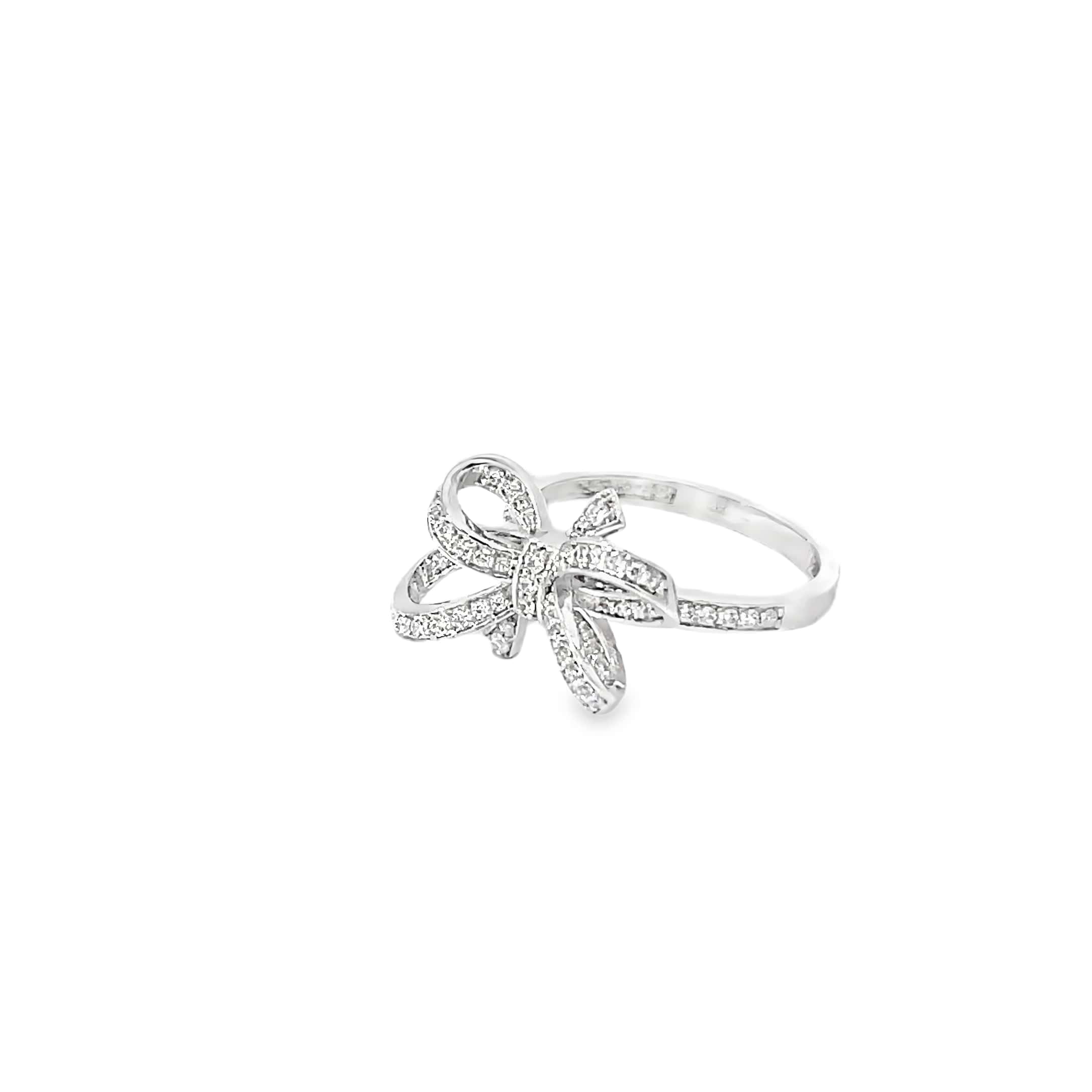 SPARKLING BOW TIE RING IN SILVER